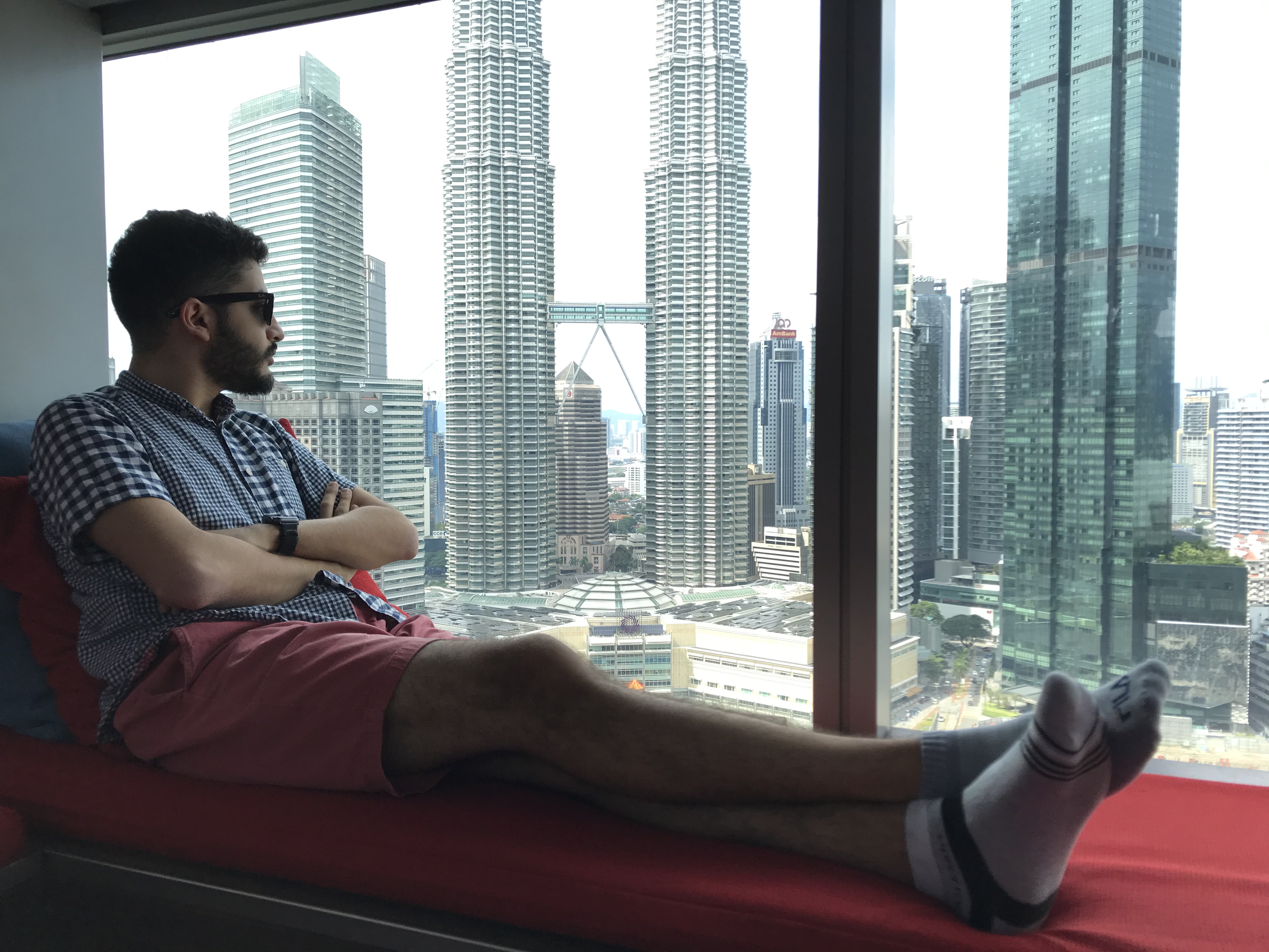 Me looking at the twin towers in Kuala Lumpur, December 2019