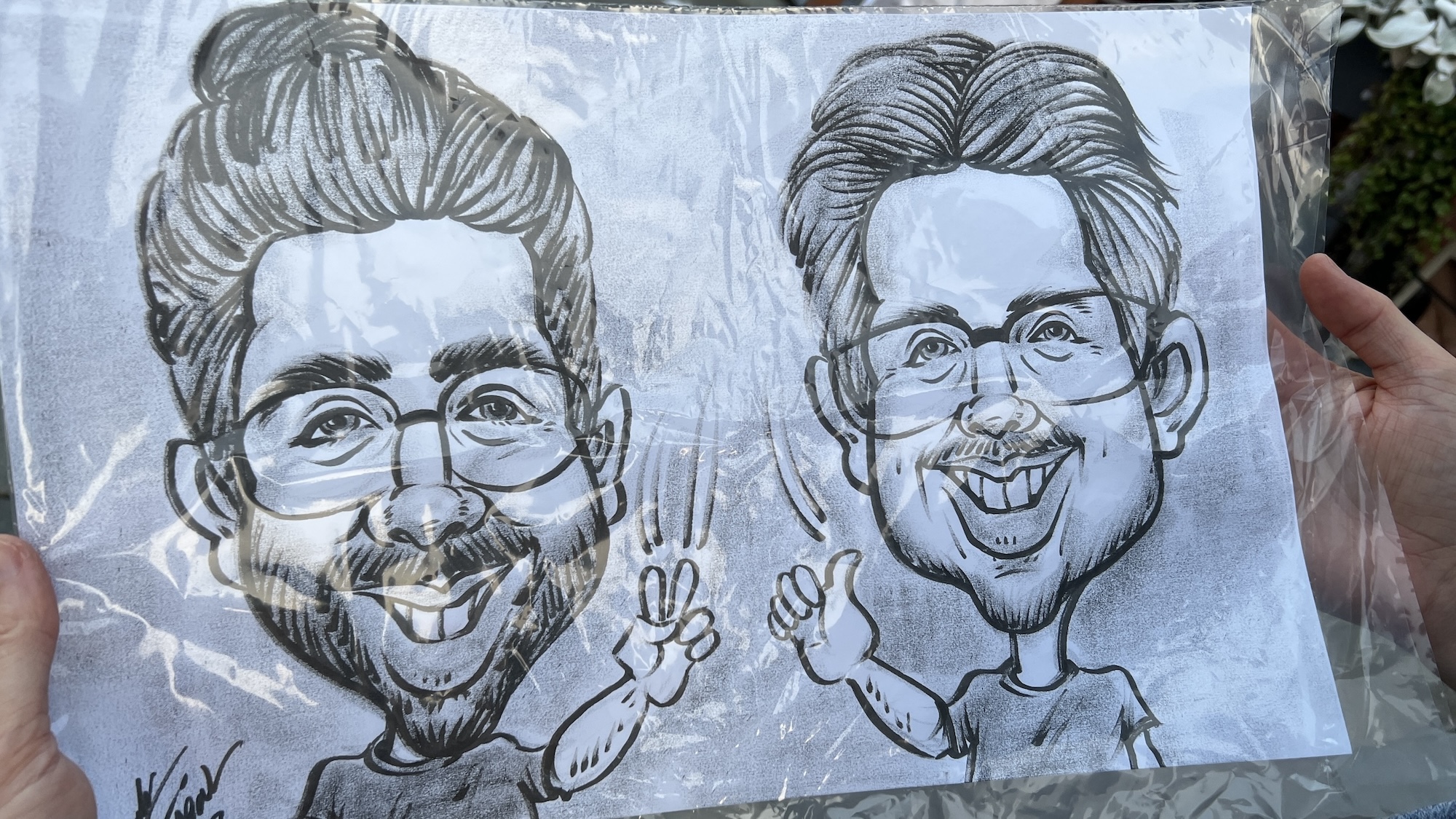 Caricature of me and a friend in Montreal, August 2023