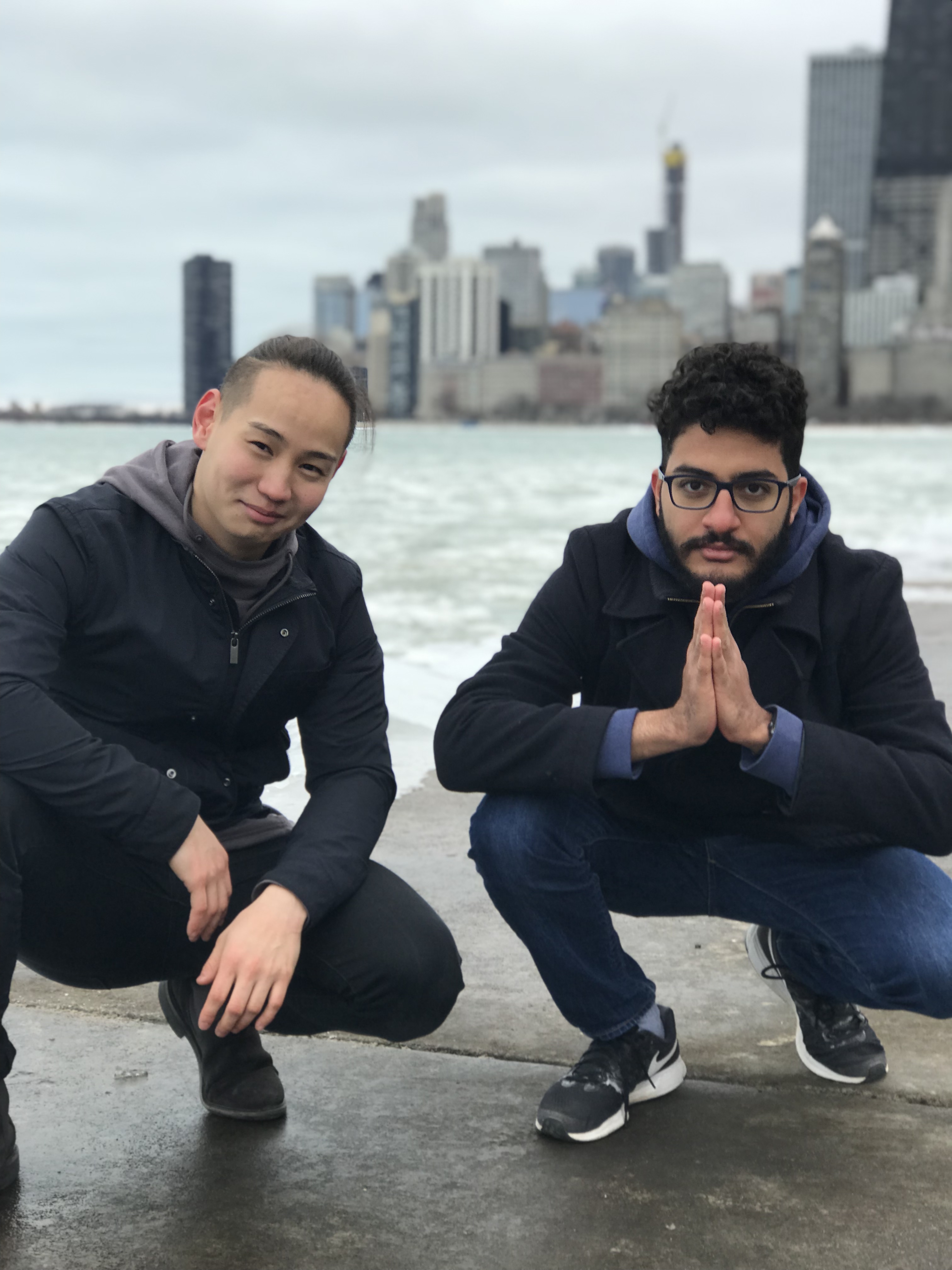 Me kneeling and looking at the camera with a friend in Chicago, February 2019