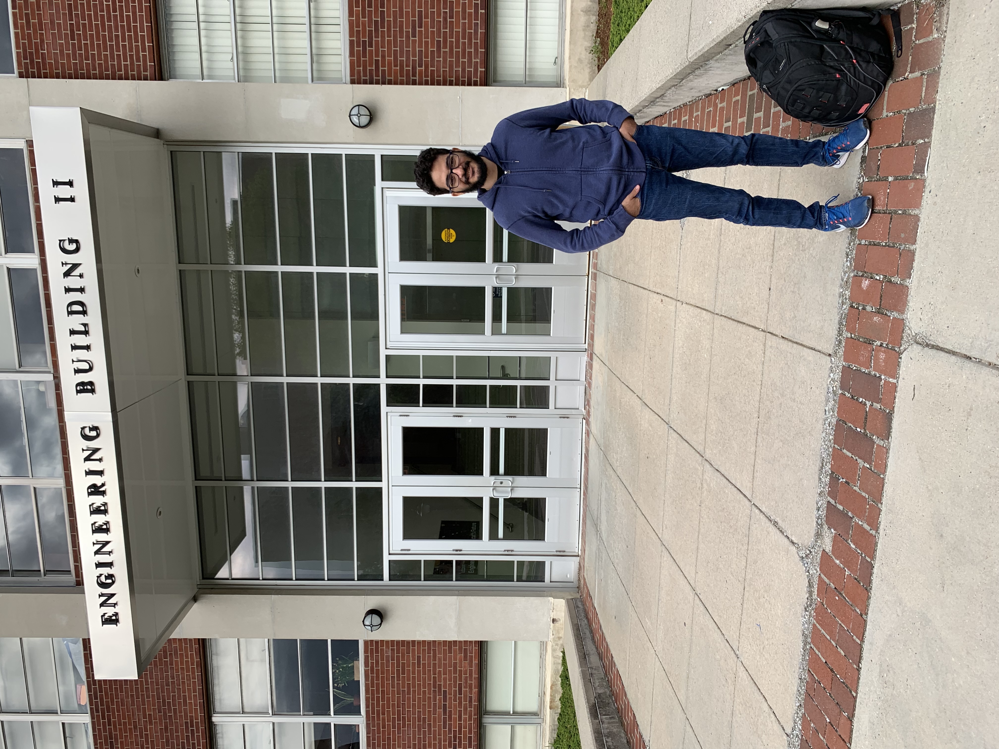Me in front of a University of Connecticut building, May 2019