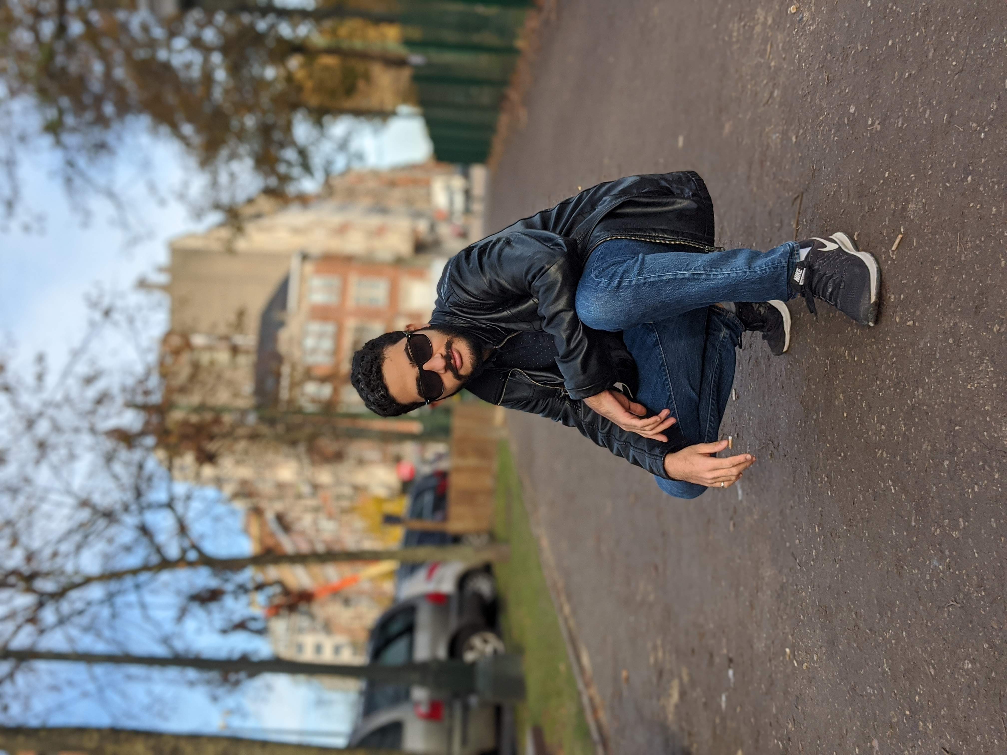 Me kneeling and looking at the camera in Brussles, October 2019